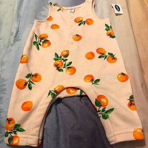 NWT. Orange Romper.
